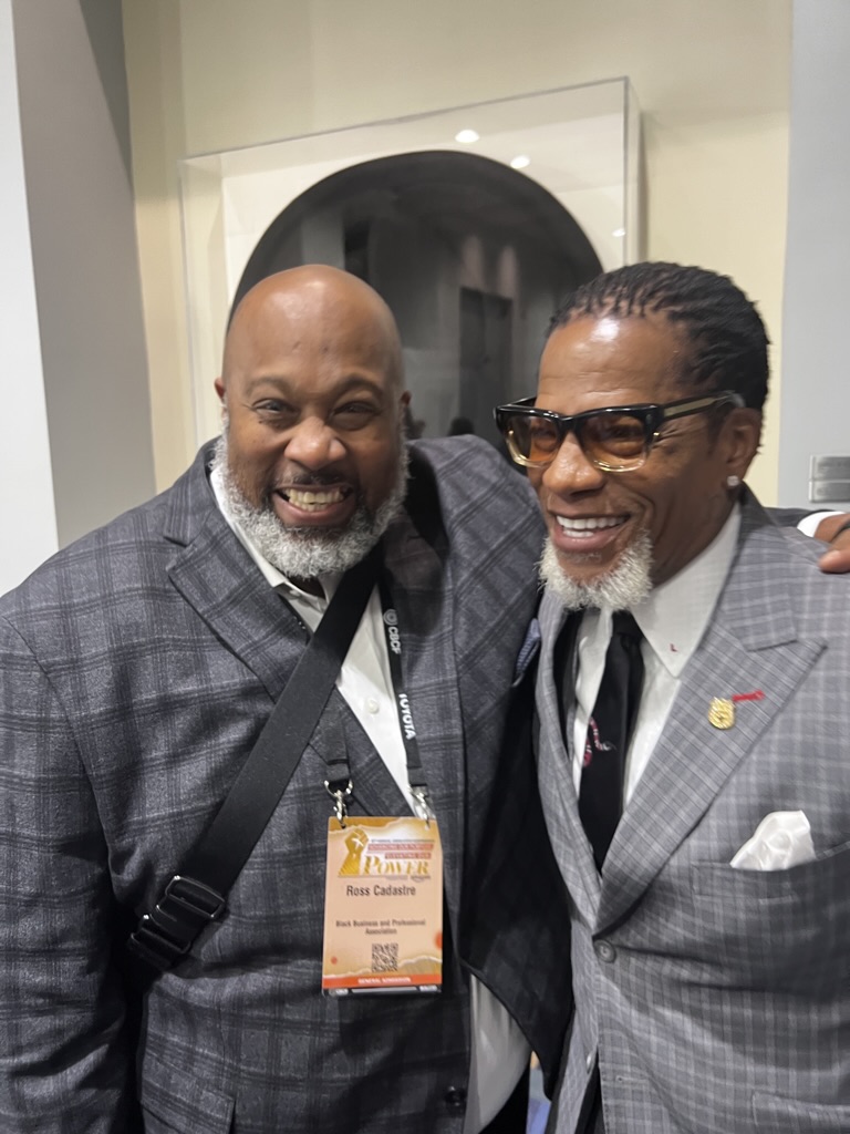 Ross with comedian and host D.L. Hughley